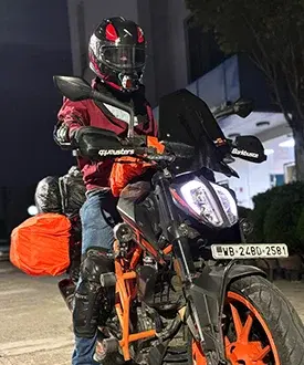 Motorcycle rider exploring scenic Indian countryside