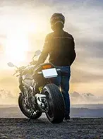 Biker on a mountain highway motorcycle tour